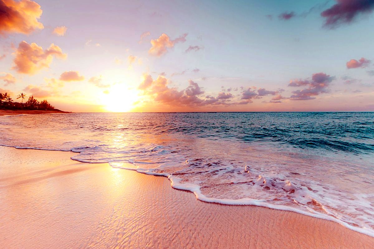 Turquoise Caribbean water and sandy beach shoreline