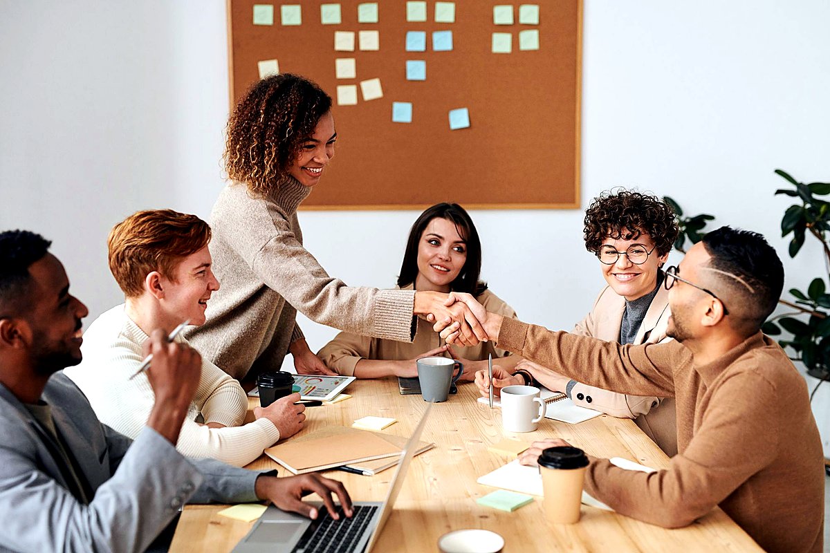 Diverse professionals collaborating around a conference table